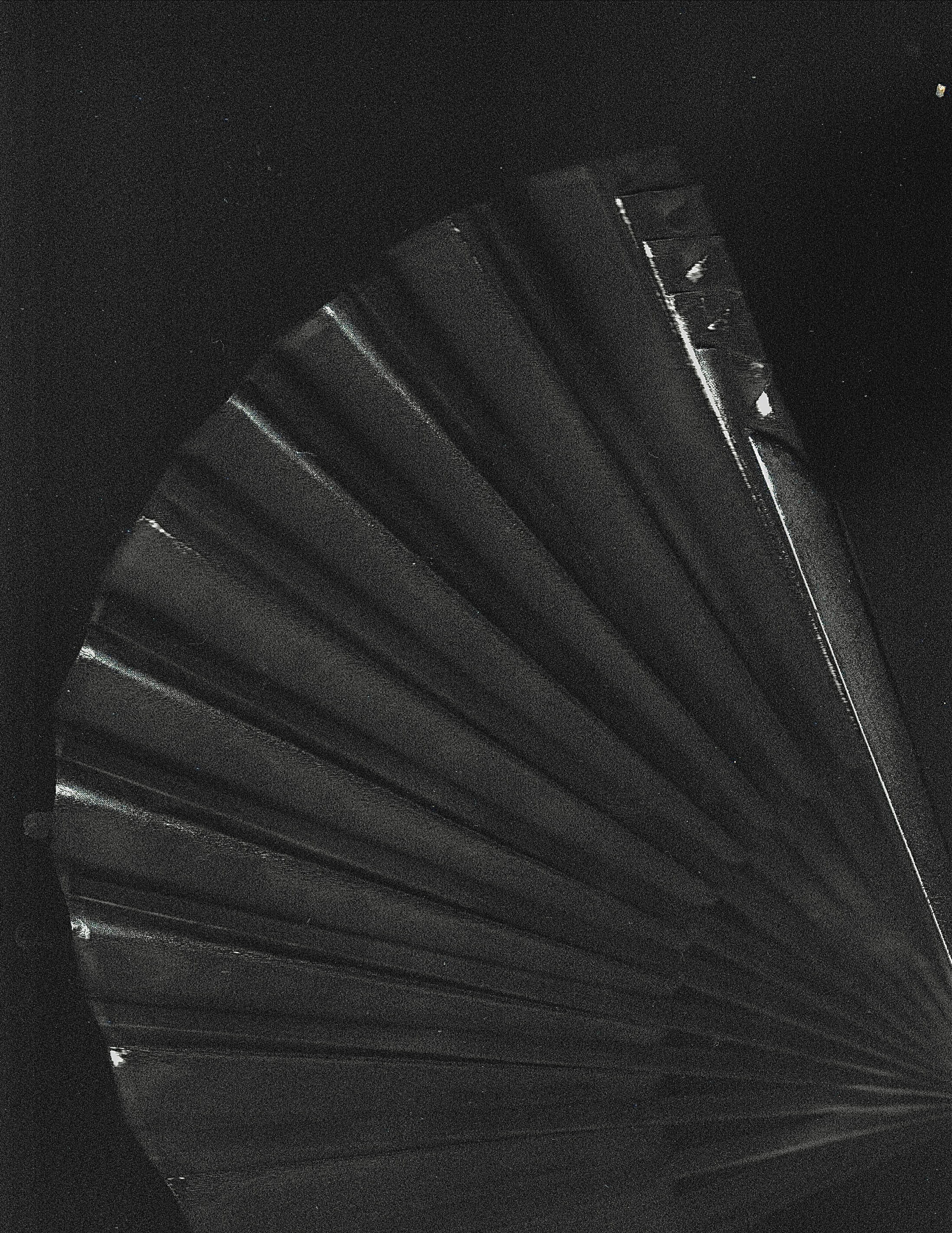 Babylon — sculptural fan, radiating pleats